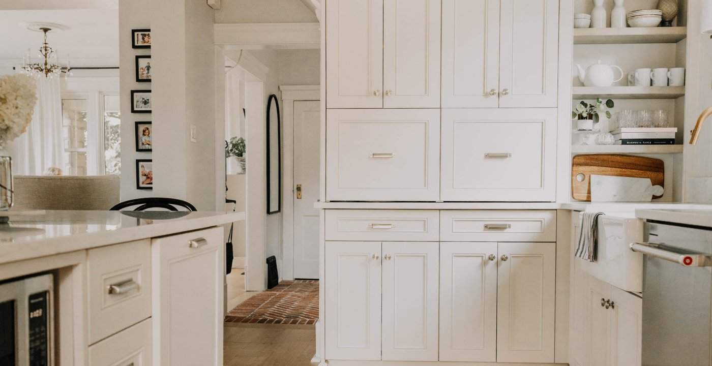 Custom White Kitchen Cabinets Using Pale Oak.